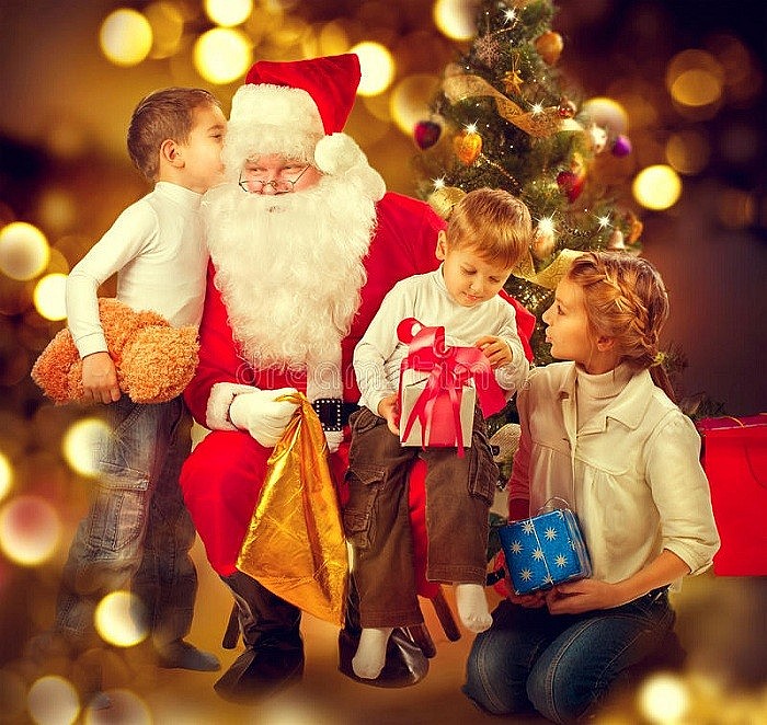 The image of Santa Claus in a red costume brings gifts to children on Christmas Day