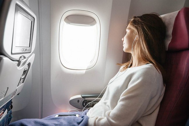 Why You Should Never Change Seats On A Plane