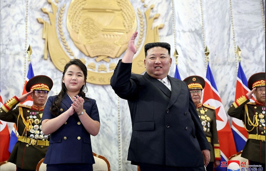 North Korean leader Kim Jong Un and his daughter Kim Ju Ae at the military parade