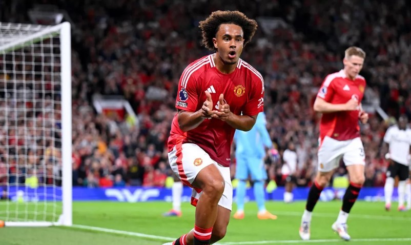 Joshua Zirkzee of Manchester United celebrates scoring his team's first goal during the Premier League match between Manchester United FC and Fulham FC.  Image credit: Getty Images