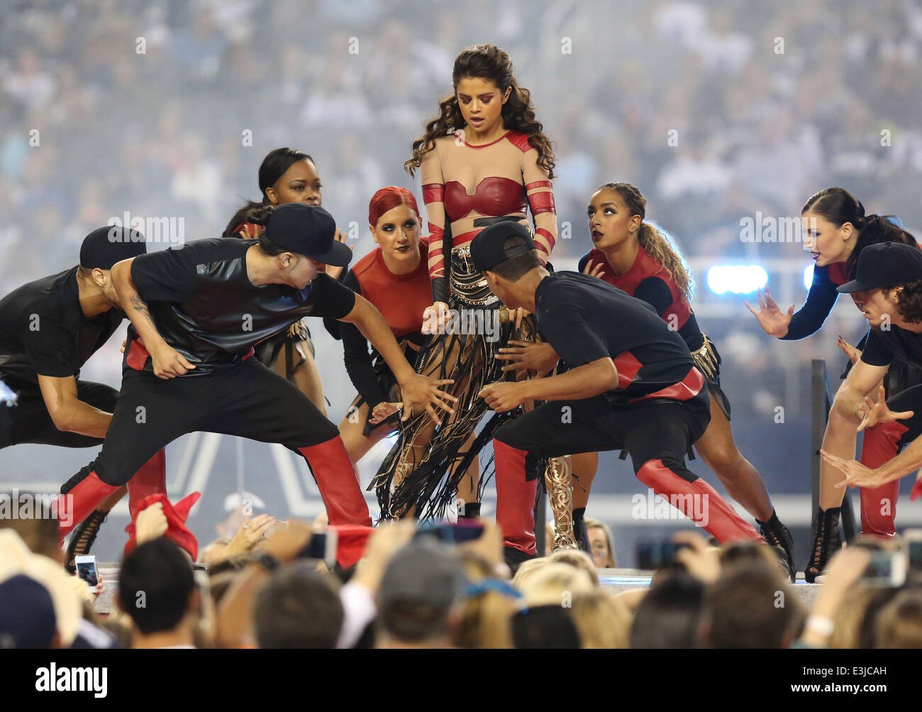 Selena Gomez performs during the halftime show during a Thanksgiving Day NFL football game between the Oakland Raiders and the Dallas Cowboys at AT&T Stadium Featuring: Selena Gomez Where: Arlington, Texas, United States When: 28 Nov 2013