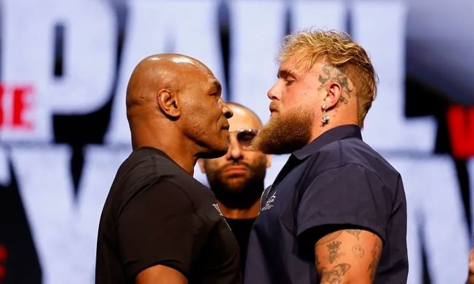 Mike Tyson (L) and Jake Paul during a promotional faceoff for their fight. Photo by Netflix