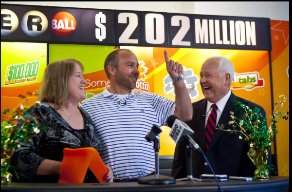 October 2012: Bondurant's Lohse family won a Powerball jackpot prize worth $202.1 million. Iowa Lottery CEO Terry Rich, right, congratulates the winners, Mary, left, and Brian, at a news conference after the couple claimed the prize.