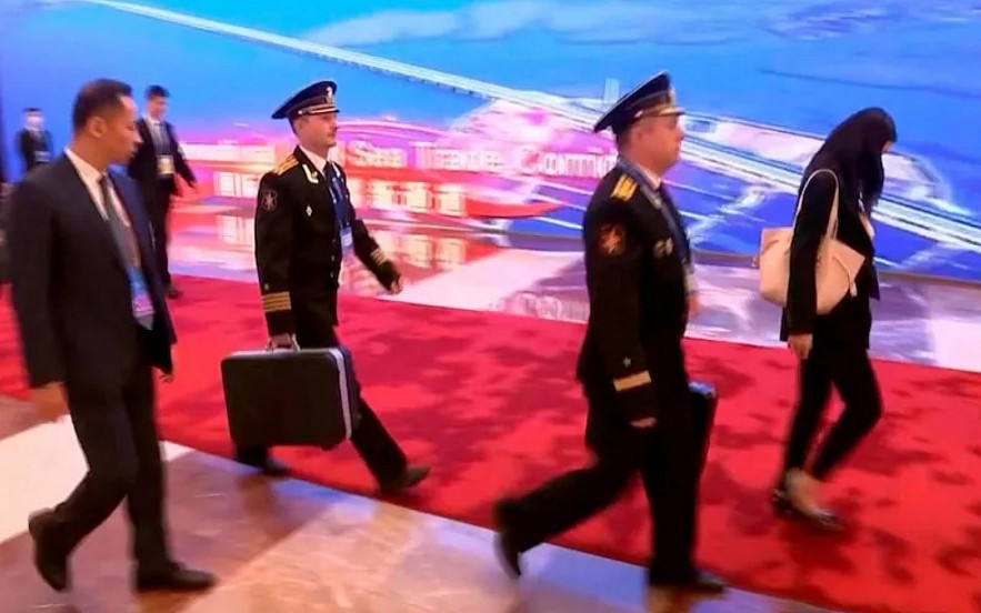 Vladimir Putin pictured in China with 'nuclear briefcase'