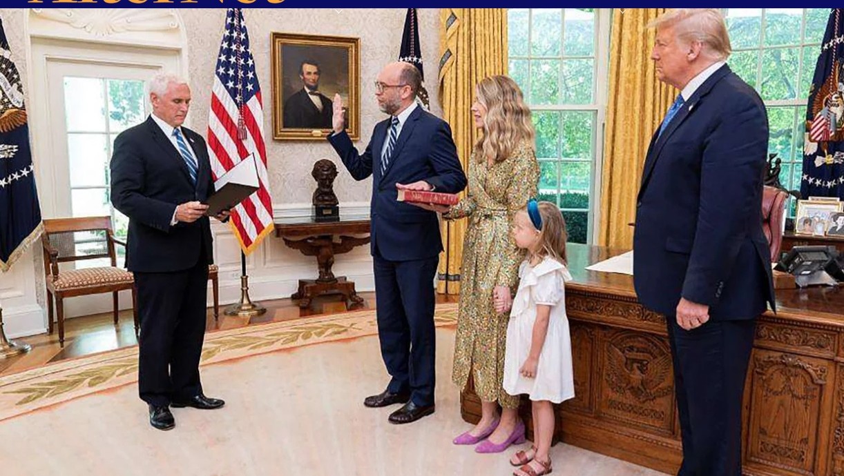 Russell Vought being sworn in, on July 22, 2020, by Vice President Michael Pence. President Donald Trump looks on