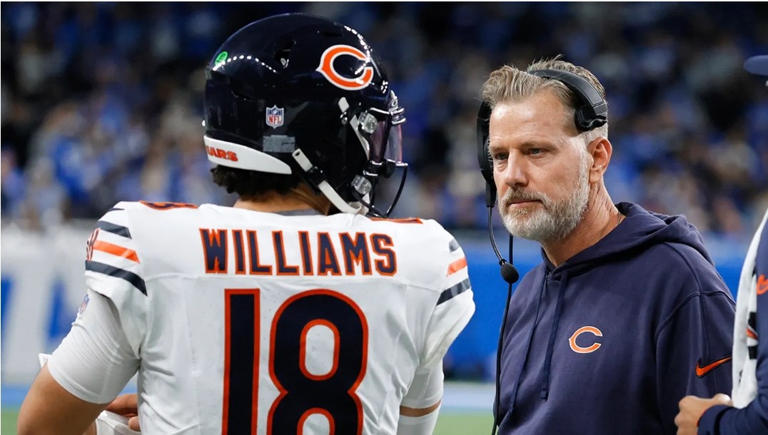 Chicago Bears quarterback Caleb Williams talks with head coach Matt Eberflus during the game against the Detroit Lions at Ford Field in Detroit on Thursday.