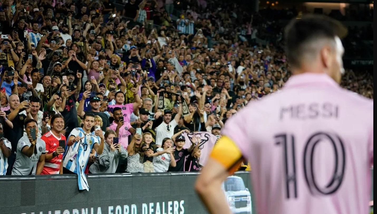 Fans cheer as Inter Miami forward Lionel Messi (10) waits for a corner kick during the second half of an MLS soccer match 