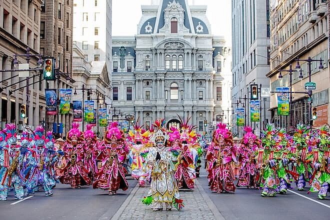 If you're from Philadelphia, you most likely remember this sea of feathered, sequined, and politically incorrect costumes and props marching up Broad Street on January 1.