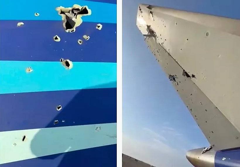 Holes in the fuselage of crashed plane suspected to be 'bullet holes'