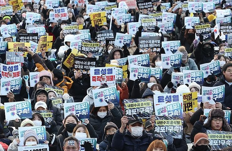 Protesters hold a rally in Seoul,