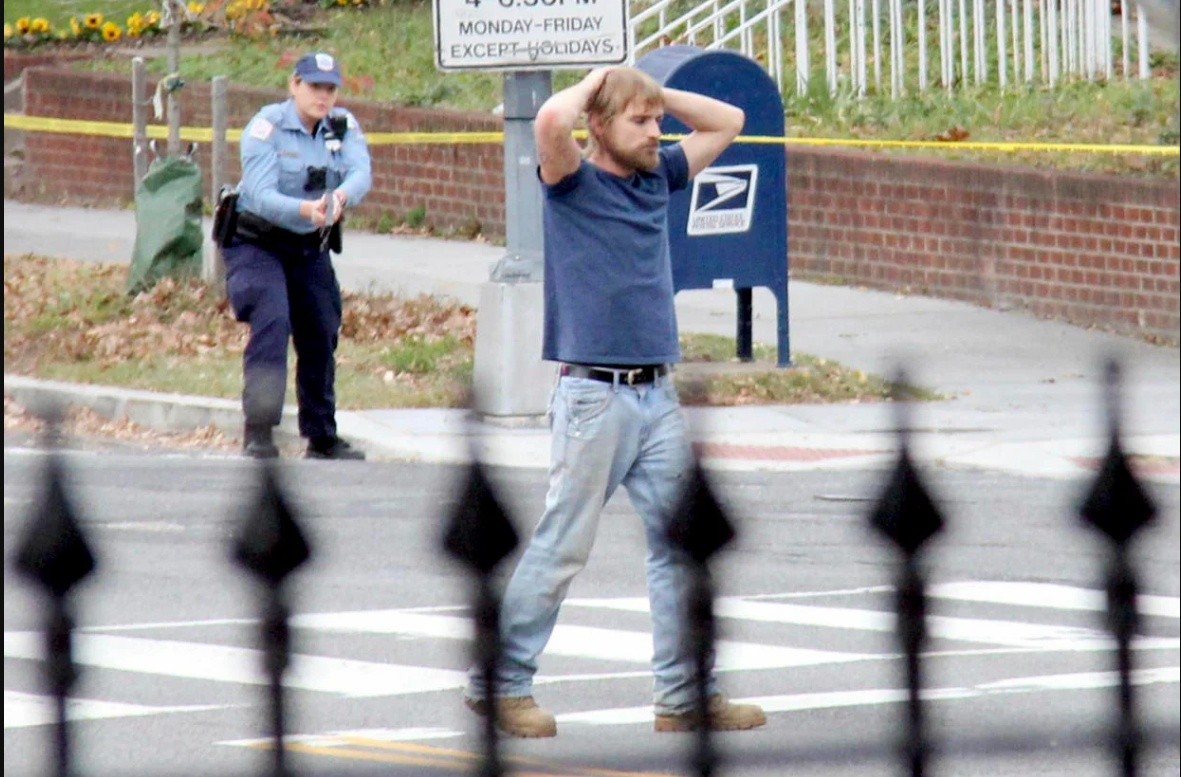 Edgar Welch, 28 of Salisbury, North Carolina, surrenders to police on Dec. 4, 2016, in Washington, D.C.