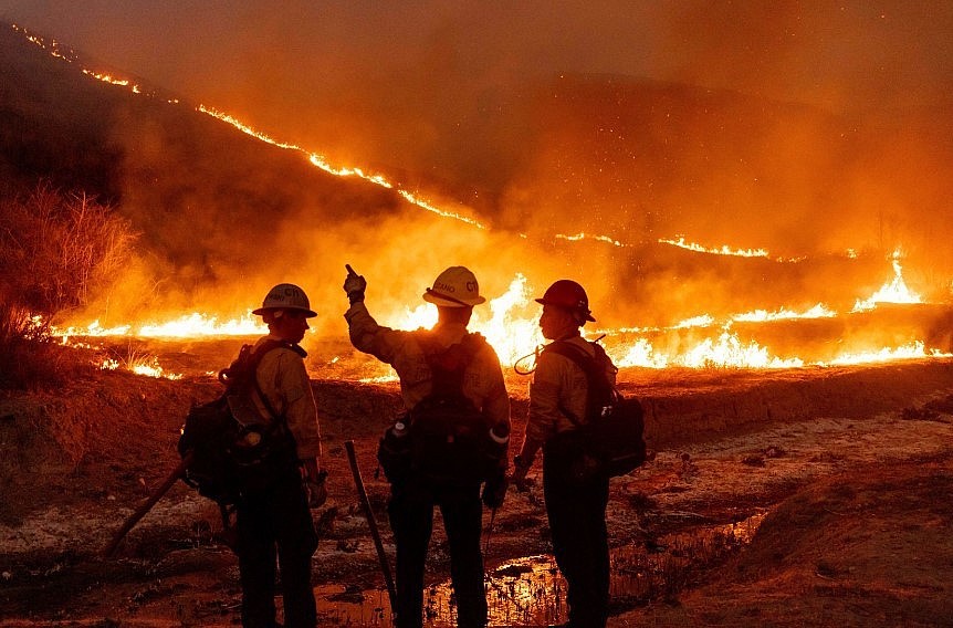 Fire crews battle the Kenneth Fire in the West Hills section of Los Angeles, Thursday, Jan. 9, 2025