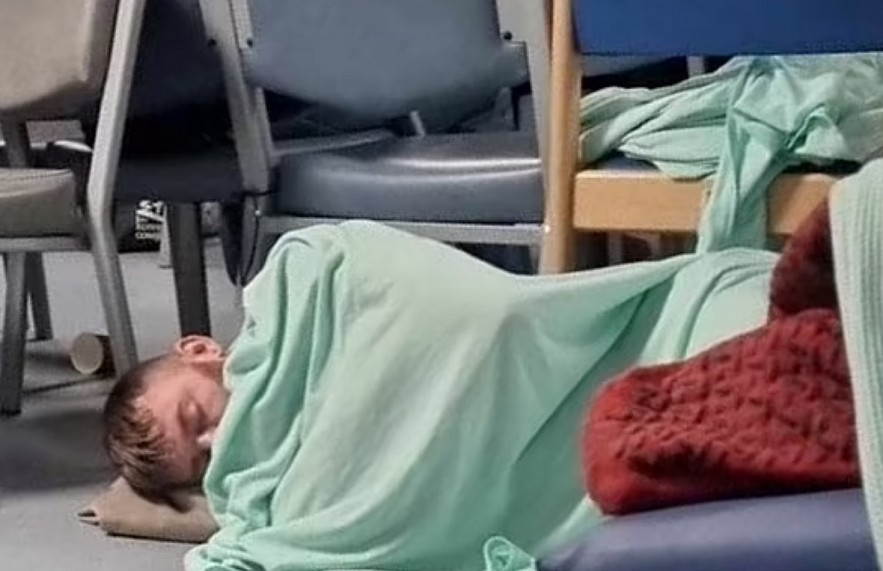 In November, Steven Wells (pictured sleeping on the floor at William Harvey Hospital in Ashford, Kent) had to wait for admission for 45 hours in A&E after he began throwing up blood.