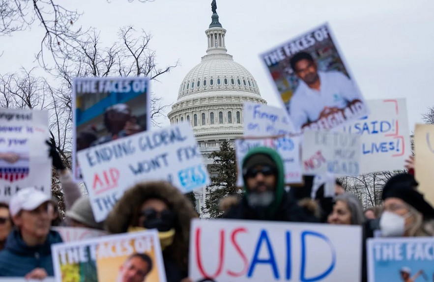 Protestors gather outside of the U.S. Capitol for a rally in support of USAID in Washington, DC