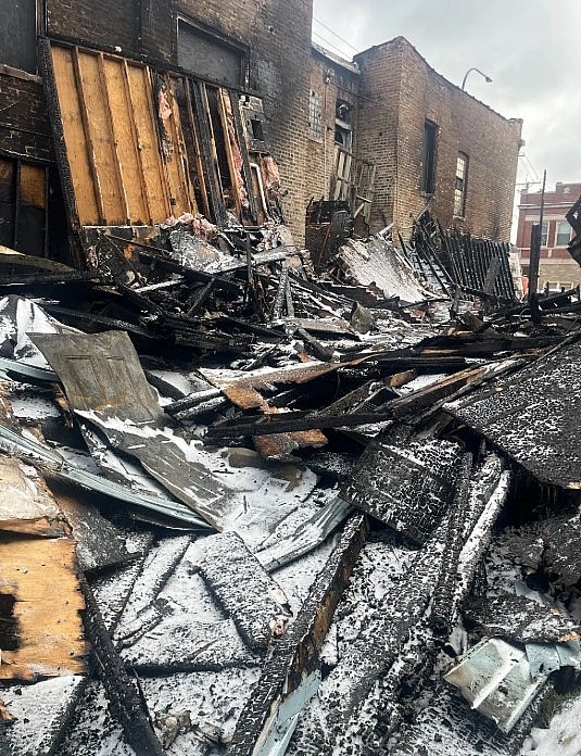 The fire expanded to a neighboring building, displacing 11 families. GoFundMe