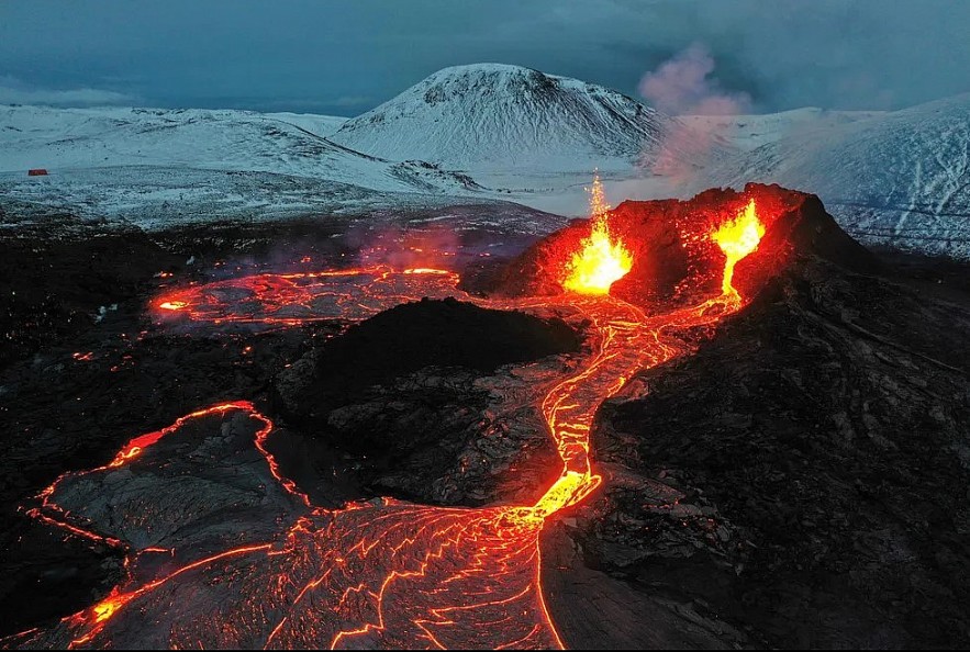 Lava flows from an eruption of a volcano on the Reykjanes Peninsula in Iceland on, March 28, 2021