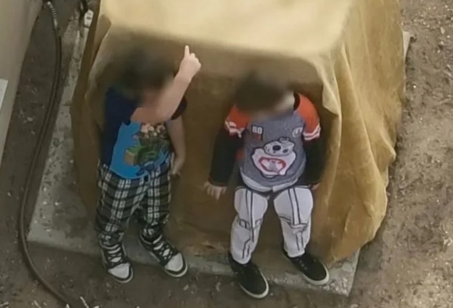 Shocking video shows boys, 7 and 9, in armed standoff with deputies