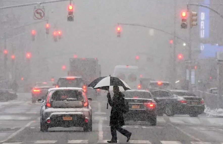 A cold front will usher in bone-chilling temperatures and a possible wintry mix of rain and snow in New York City on Thursday A cold front will usher in bone-chilling temperatures and a possible wintry mix of rain and snow in New York City on Thursday