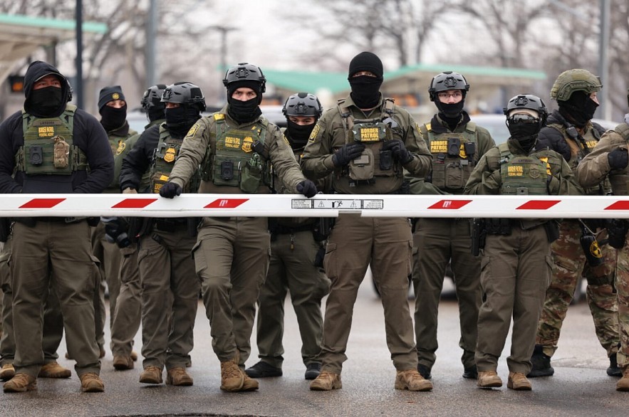 US Border Patrol agents stand guard at the Bishop Henry Whipple Federal Building in Minneapolis, Minnesota US Border Patrol agents stand guard at the Bishop Henry Whipple Federal Building in Minneapolis, Minnesota