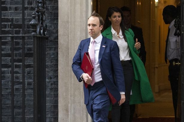 Health Secretary Matt Hancock leaves 10 Downing Street with aide Gina Coladangelo in May last year. Photo Getty