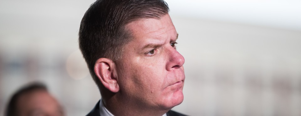 Boston Mayor Marty Walsh listens to a question at a press conference in March 2020 in Boston, Mass. Photo by Scott Eisen/Getty Images