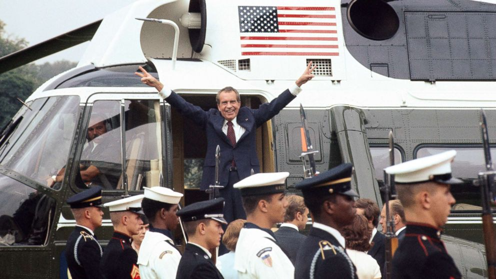 Bettmann Archive via Getty Images Richard Nixon smiles and gives the victory sign as he boards the White House helicopter after resigning the presidency, Aug. 9, 1974.