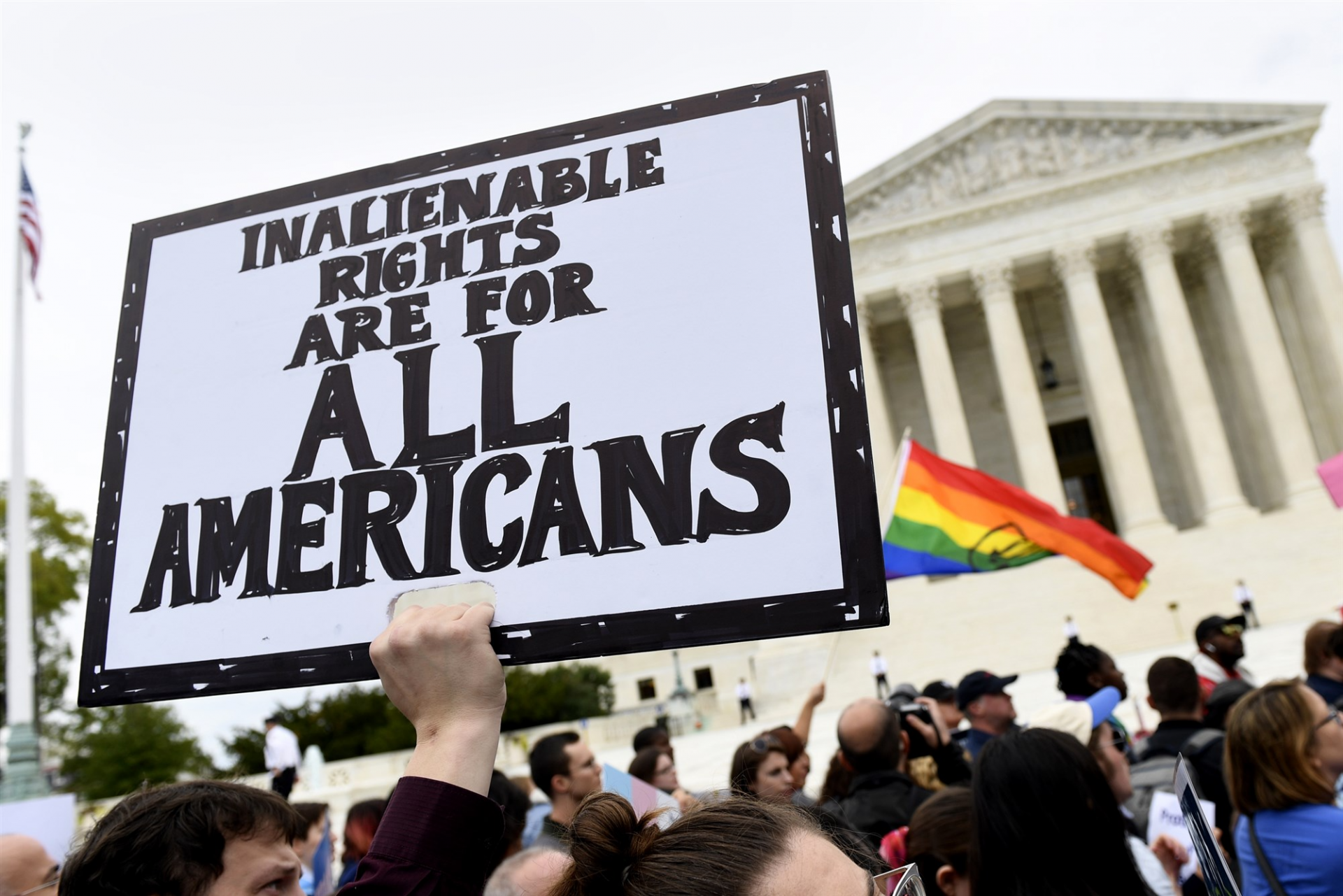 Protesters gathered at the Supreme Court as arguments were heard in a case affecting LGBTQ rights on Oct. 8, 2019.Susan Walsh / AP file.