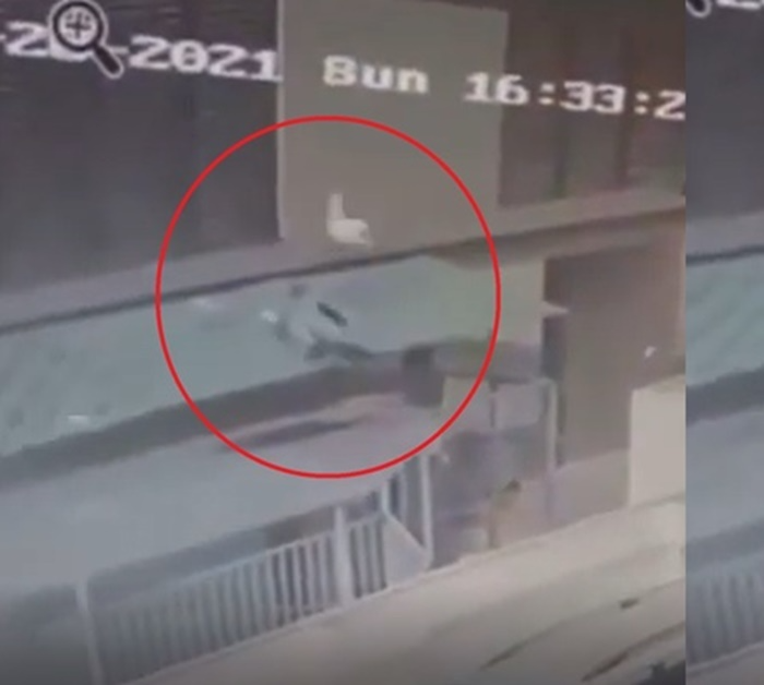 Another perspective of camera showing how Vietnamese 'Superhero' delivery man saves girl falling from 12th floor