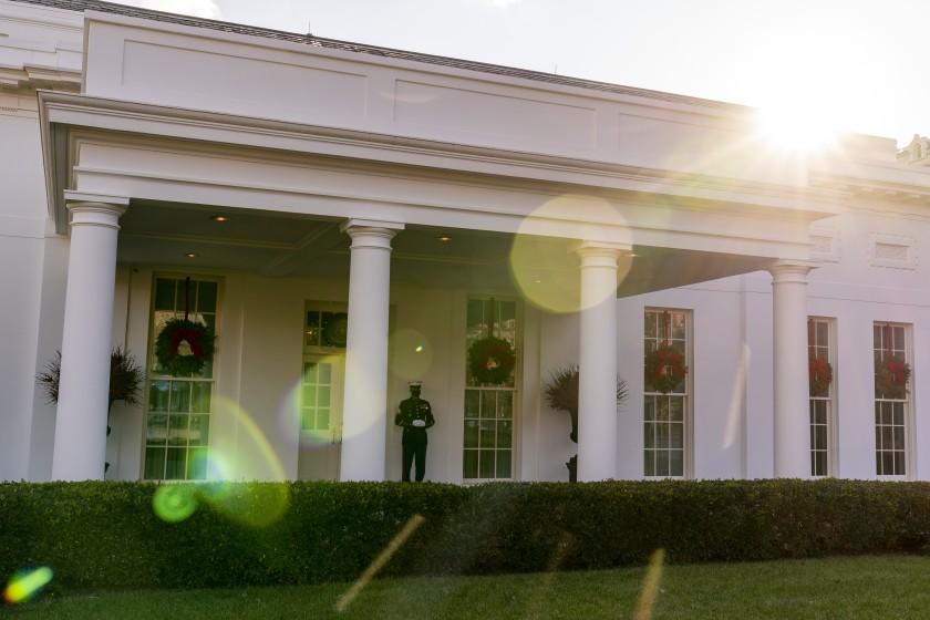 A Marine stands outside the entrance to the West Wing of the White House, signifying the President is in the Oval Office, Tuesday, Dec. 22, 2020, in Washington. (AP Photo/Andrew Harnik)(ASSOCIATED PRESS)