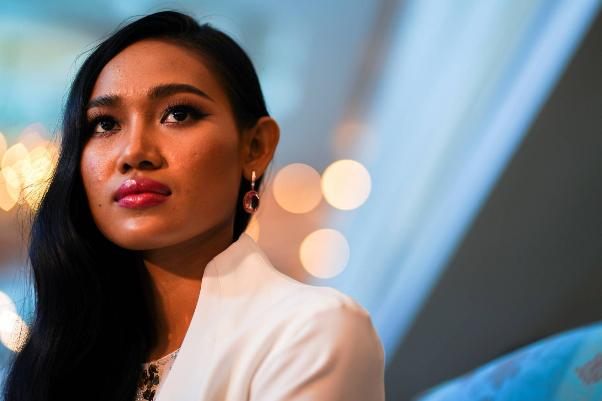 Han Lay, Miss Grand Myanmar, looks on during an interview in Bangkok on Friday. | REUTERS