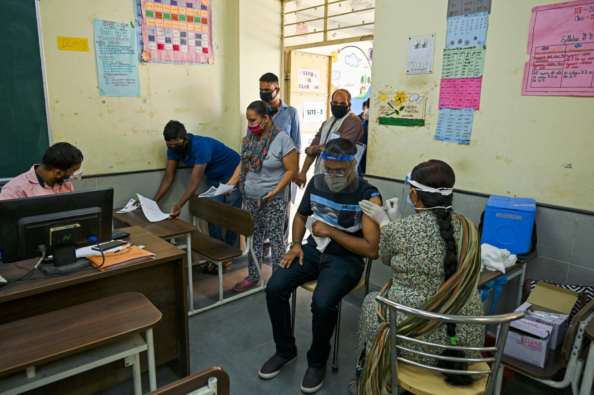 A vaccination center at a school in New Delhi on Wednesday. Credit...Tauseef Mustafa/Agence France-Presse — Getty Images