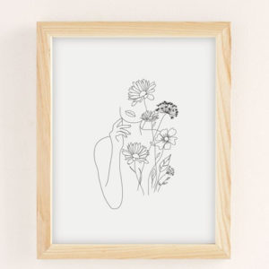 Drawing of a woman and flowers wall art
