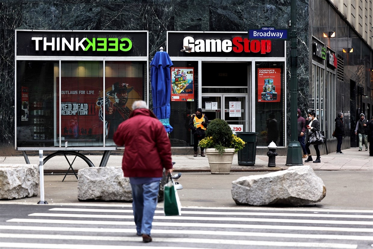 People walk past a GameStop store in New York City on Wednesday.Michael M. Santiago / Getty Images
