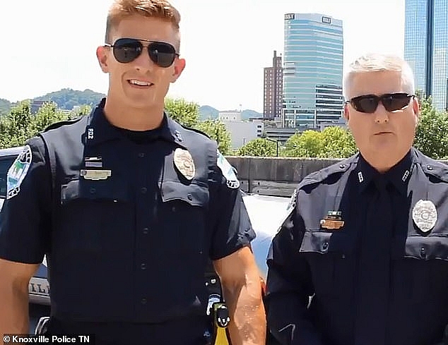  The clip, which was shared to the Knoxville Police Twitter account, saw Officer White (L) and Officer Wilson (R) explaining a new 'Hands Free' road safety law 