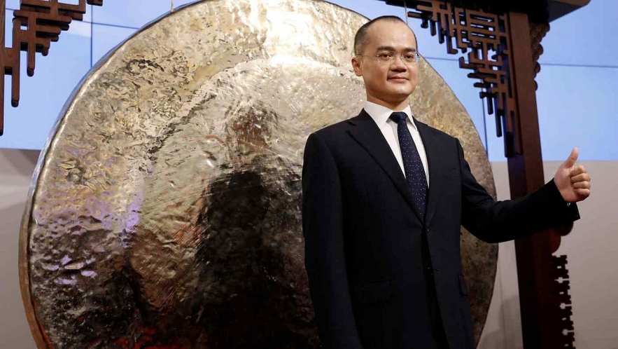 Meituan co-founder and CEO Wang Xing attends the 2108 debut of the company at the Hong Kong exchange.    © Reuters